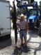 Chuck Hallier 9 foot Alligator taken with his bow.